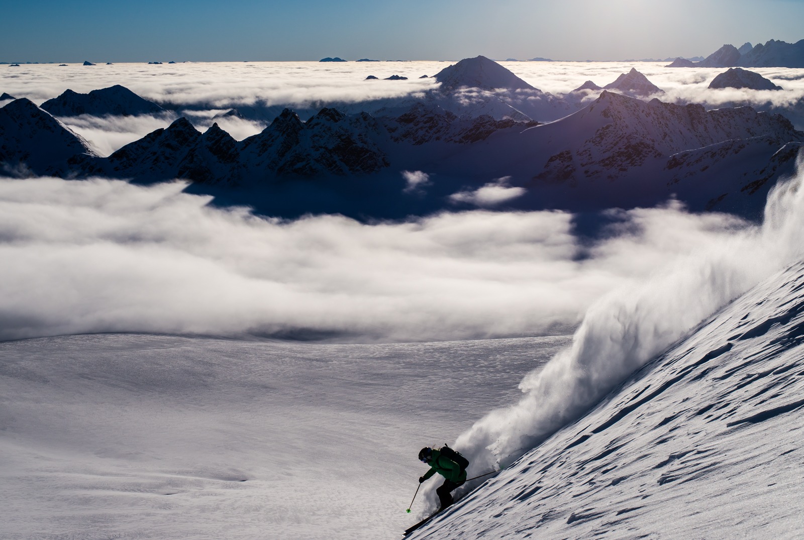 skier with mountains in background