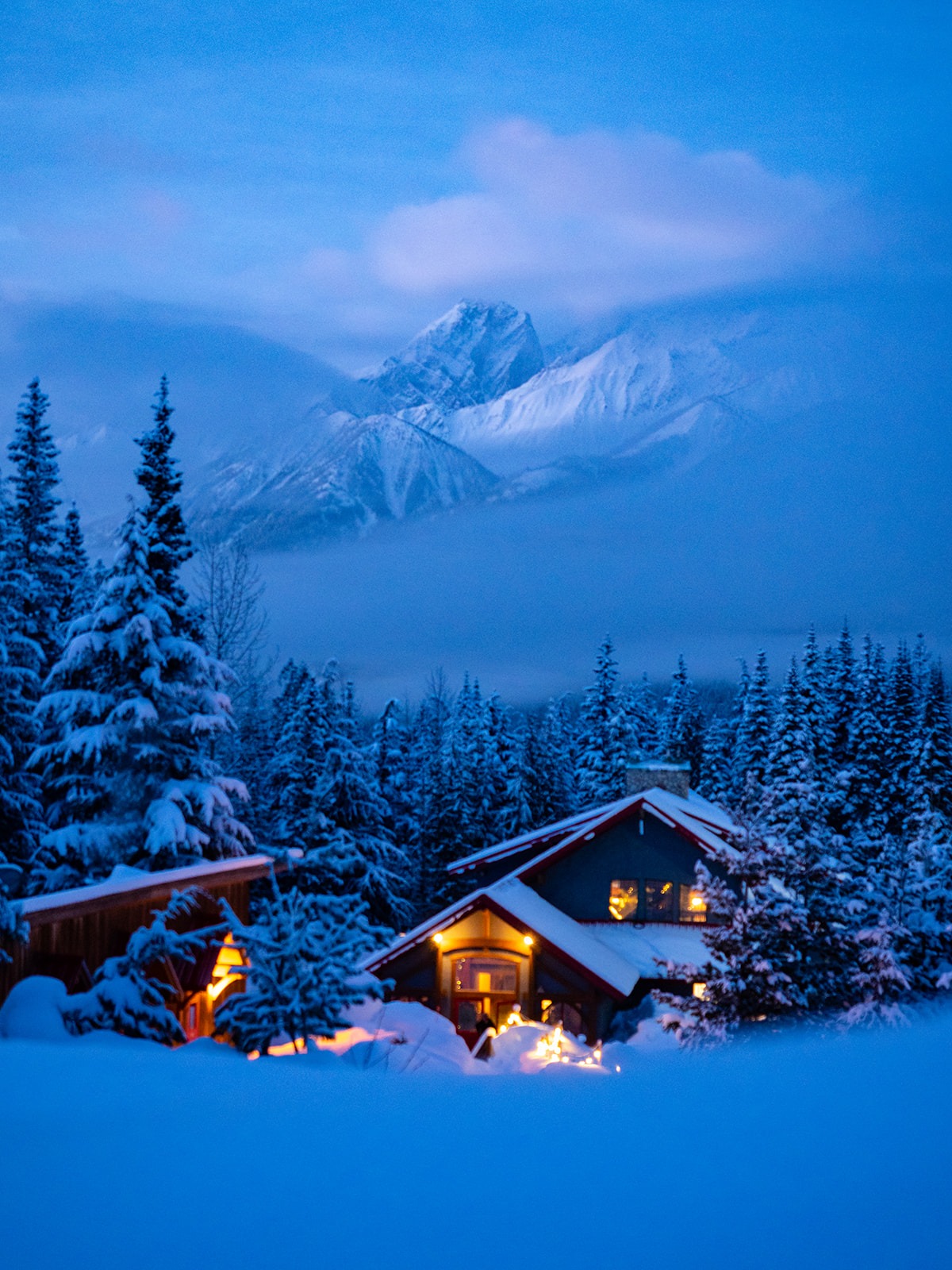 Winter lodge with Glacier National Park background