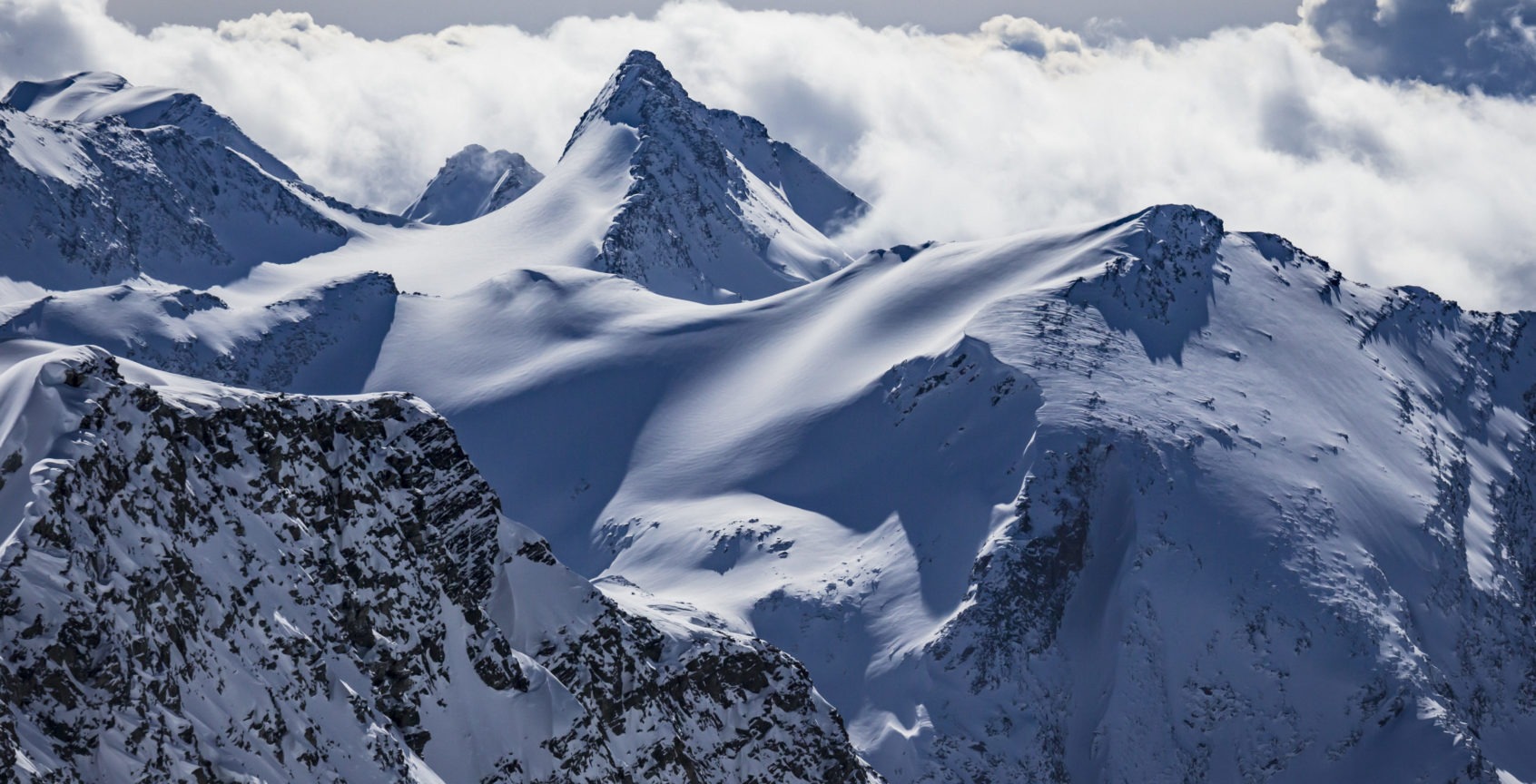 Mountain peaks in Great Canadian Heli-Skiing terrain