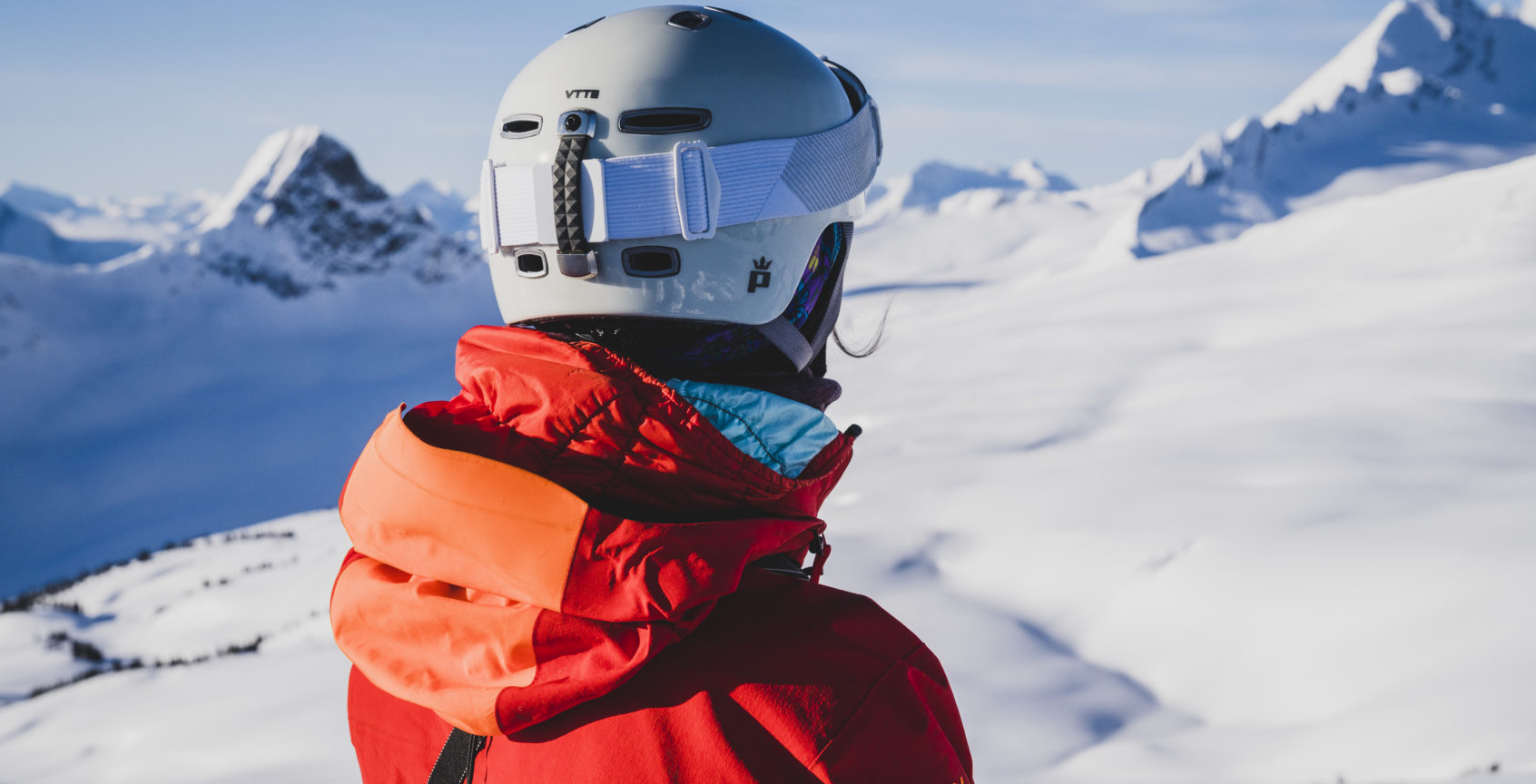 Heli-skiing guide in alpine terrain