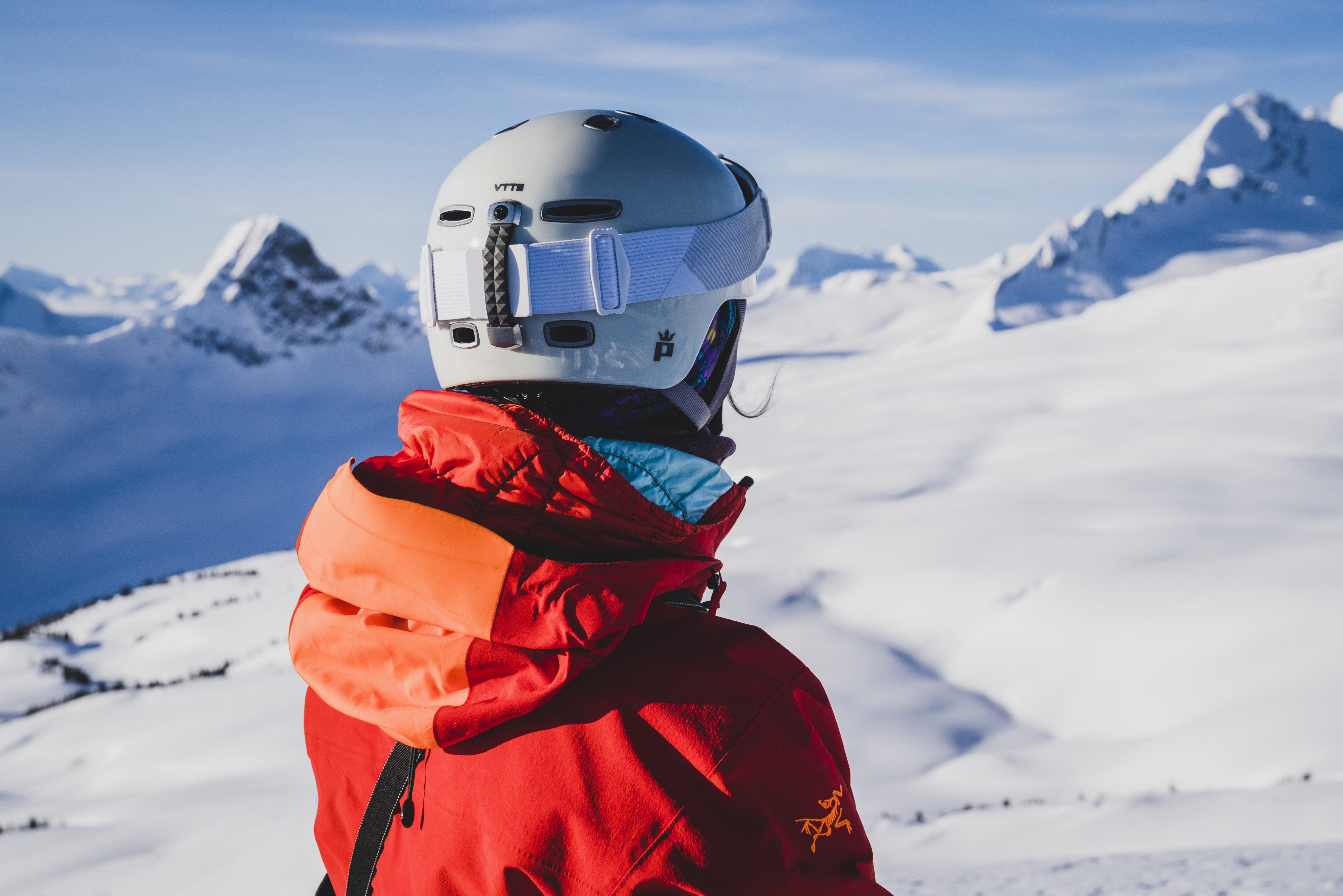Heli-skiing guide in alpine terrain