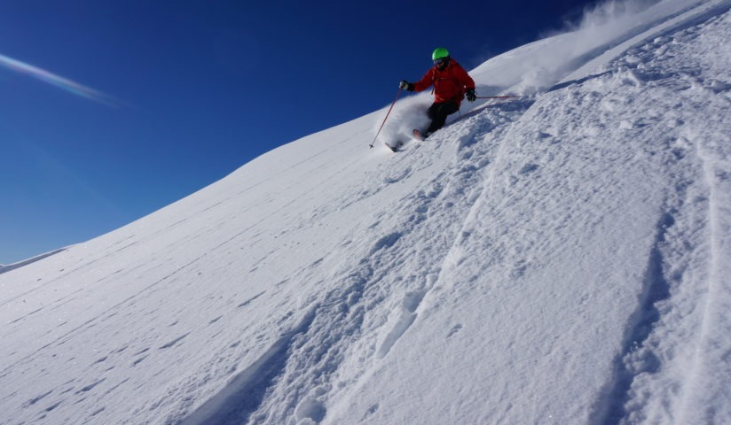 Heli-skiing powder in alpine